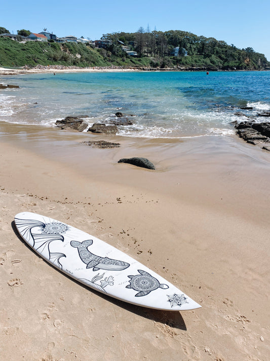 In the ocean surfboard